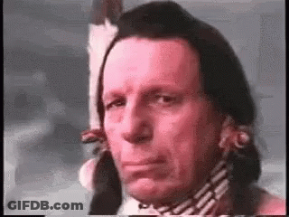 Man In Native American Headdress GIF