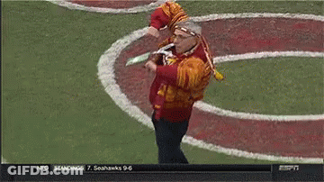 Man In Native American Outfit On Field GIF