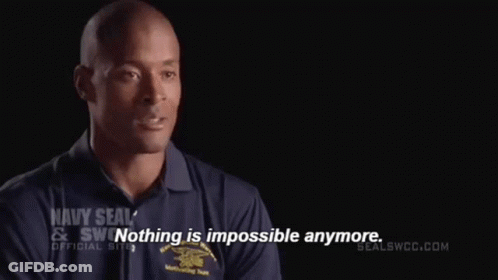 Man In Navy SEAL Shirt Saying Nothing Is Impossible Anymore GIF