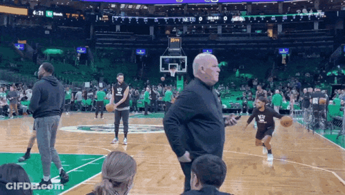 Man In NBA Shirt On Basketball Court GIF