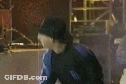 Man In NBC Sports Jersey Smiling Beside Another GIF