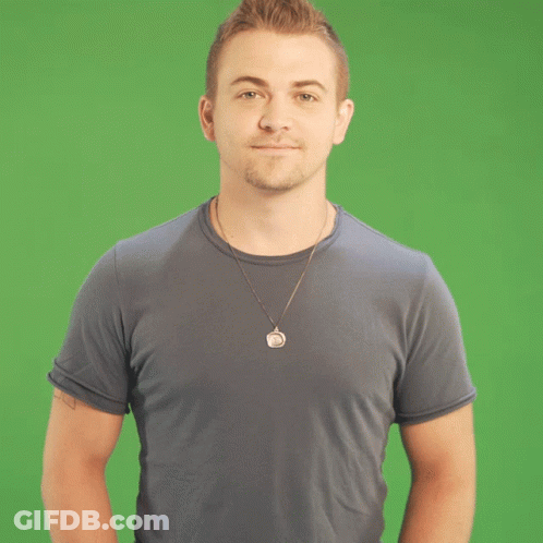 Man In Necklace And Blue Shirt Making Face GIF