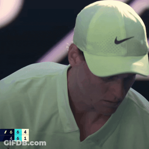 Man In Neon Green Nike Hat GIF