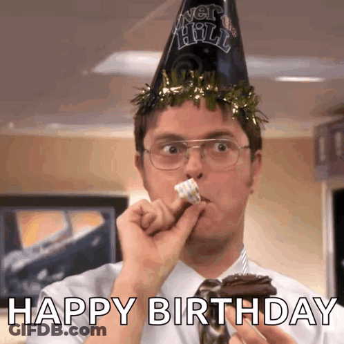 Man In New Year's Eve Hat Eating Cake GIF