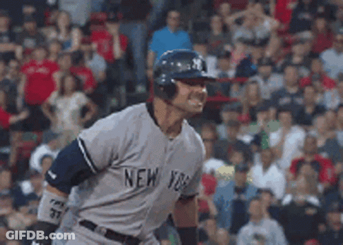 Man In New York Jersey In Front Of Crowd GIF