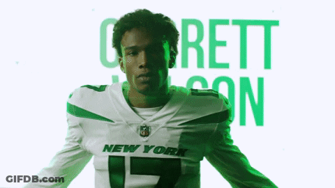 Man In New York Jets Jersey On Green Background GIF