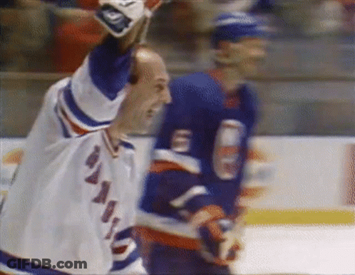 Man In New York Rangers Jersey Standing On Ice GIF
