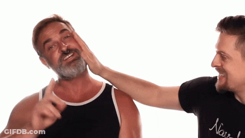 Man In New York Shirt Touching Nose Ring Man GIF