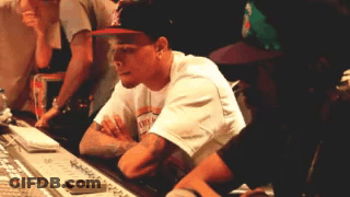 Man In New York Yankees Hat Sitting At Desk GIF