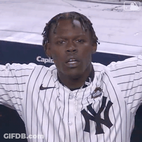 Man In New York Yankees Jersey With Arms Outstretched GIF