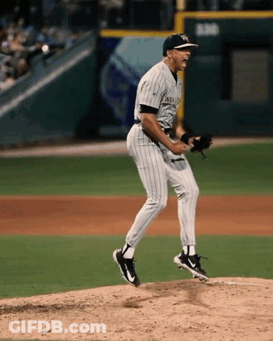 Man In New York Yankees Uniform On Mound GIF
