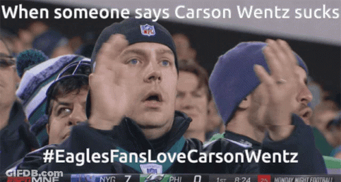 Man In NFL Hat Stands In Crowd GIF