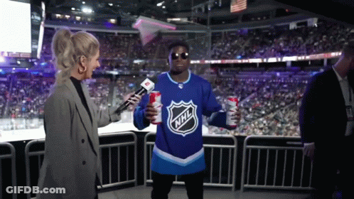 Man In NHL Jersey Interviewed By Reporter GIF