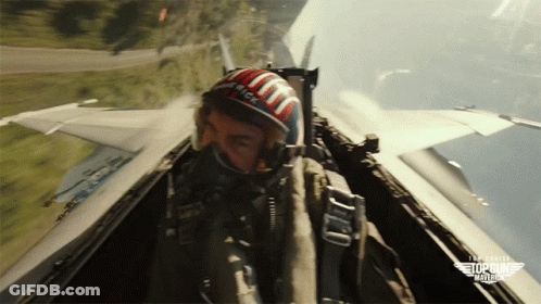 Man In Nick Helmet Flying Plane GIF