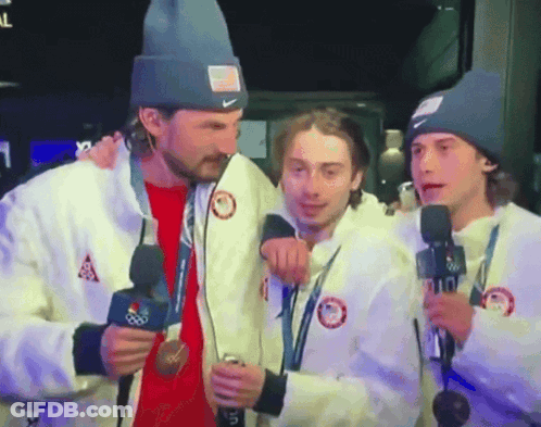 Man In Nike Beanie Talking Into Microphone GIF