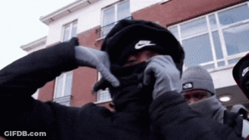 Man In Nike Hat Covering Face GIF