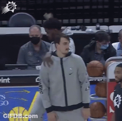 Man In Nike Jacket At Basketball Court GIF
