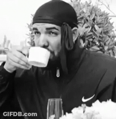 Man In Nike Jacket Drinking Cup GIF