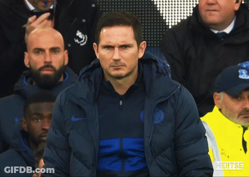 Man In Nike Jacket Stands In Front Of Crowd GIF