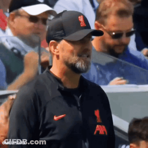 Man In Nike Jacket Watching Soccer Game GIF
