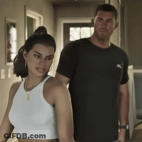 Man In Nike Shirt Next To Woman GIF