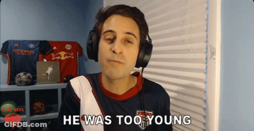 Man In Nike Shirt Talking To Another Man In Parking Lot GIF