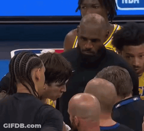 Man In Nike Shirt Talking To Men GIF