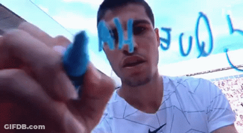 Man In Nike Shirt Writing On Whiteboard GIF