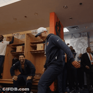 Man In Nike Sweatshirt In Locker Room GIF