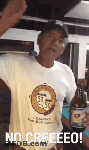 Man In No Creeeeeo Shirt Holding Beer GIF