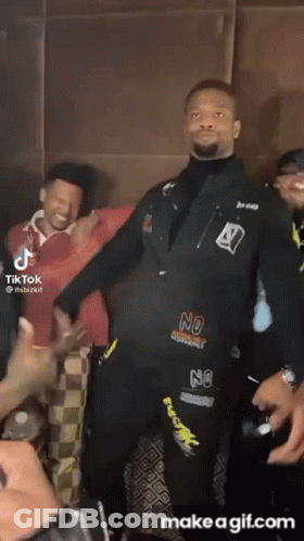 Man In No Movement Jacket Dancing With Others GIF