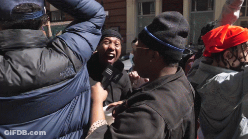 Man In North Face Jacket Interviewed GIF