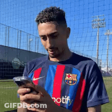 Man In Notify Striped Shirt GIF