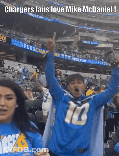 Man In Number 10 Jersey In Crowd GIF