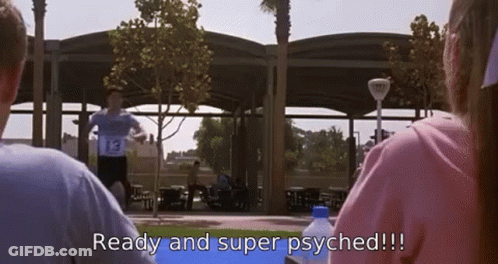 Man In Number 13 Running In Park GIF