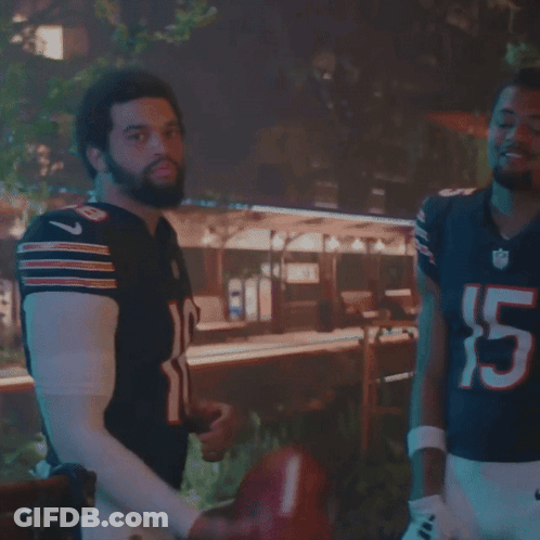 Man In Number 15 Jersey Standing Next To Another Man GIF