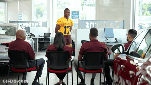 Man In Number 17 Jersey At Car Dealership GIF