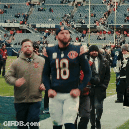 Man In Number 18 Jersey Walking GIF
