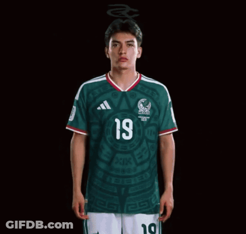 Man In Number 19 Shirt Surrounded By Flames GIF