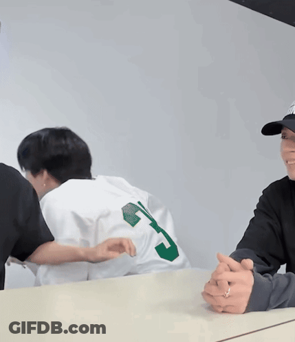 Man In Number 24 Jersey High Fiving GIF