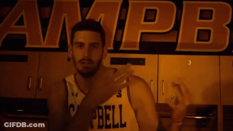 Man In Number 25 Jersey In Front Of Campbell Sign GIF