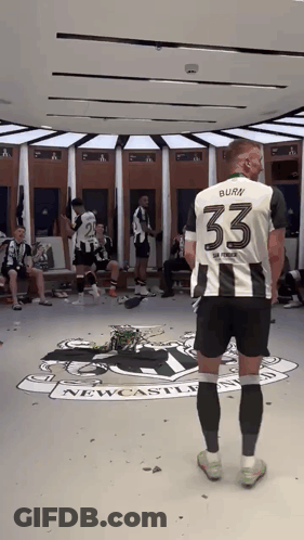 Man In Number 33 Jersey Newcastle Locker Room GIF