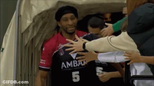 Man In Number 5 Jersey Being Hugged GIF