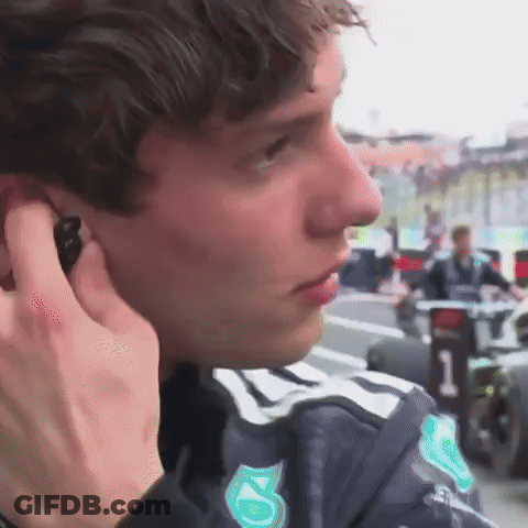 Man In Number 5 Shirt On Phone GIF