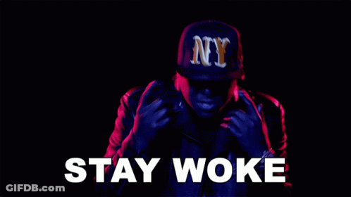 Man In NY Hat And Leather Jacket Saying Stay Woke GIF