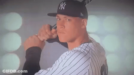 Man In NY Hat Holding Baseball Bat GIF