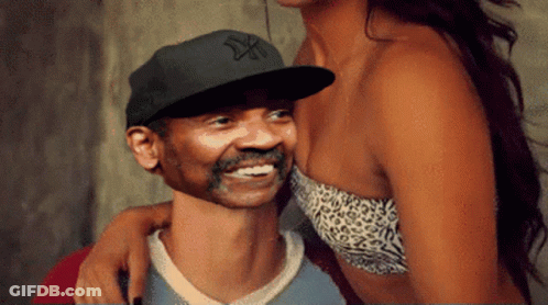 Man In NY Hat Smiling Beside Woman GIF