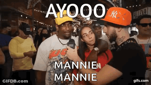 Man In NY Hat Talking To Woman GIF