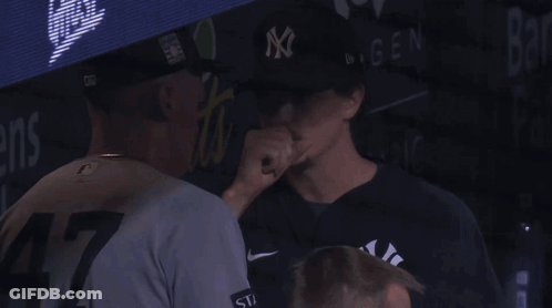 Man In NY Hat Talks To Man In Dugout GIF