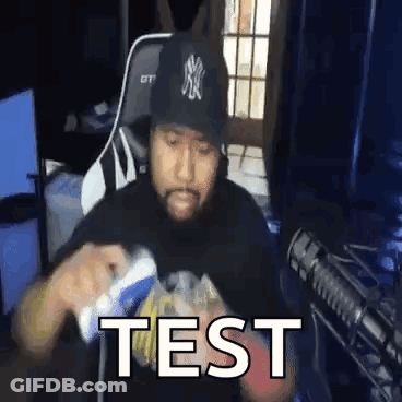 Man In NY Yankees Hat Holding Video Game Controller GIF